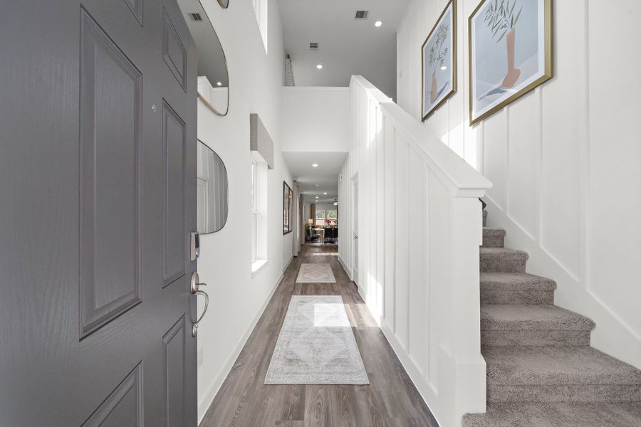 A hallway with white walls. A hallway with white walls.