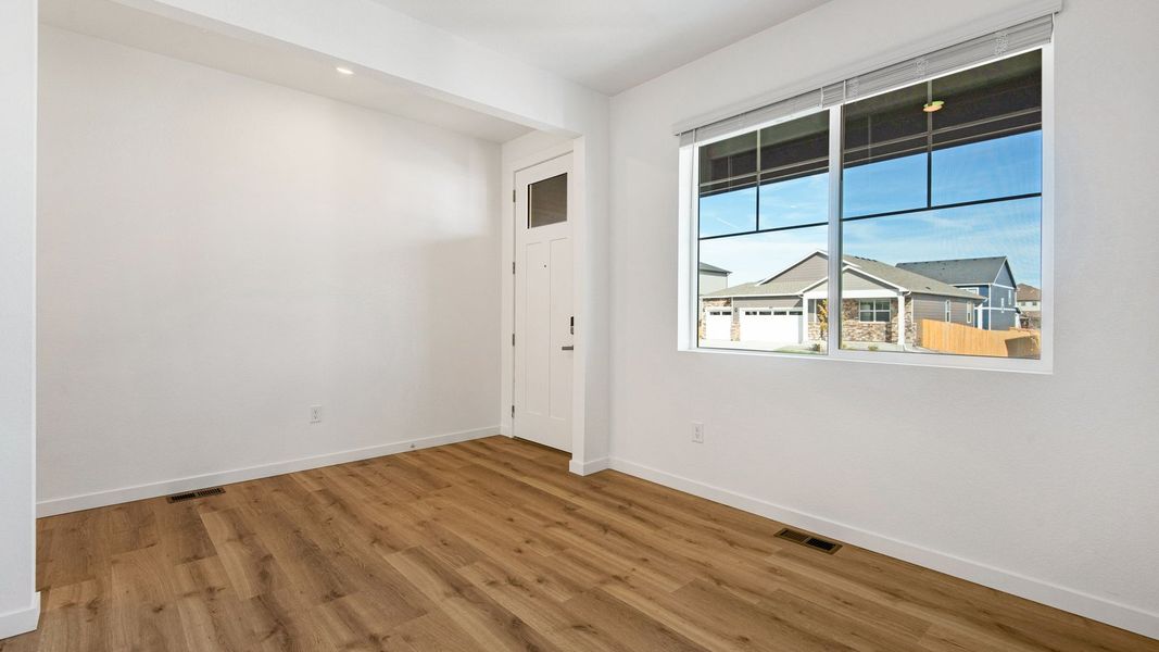 Spacious, unfurnished interior of a new home in Trails at Crowfoot, Parker (Image 14).