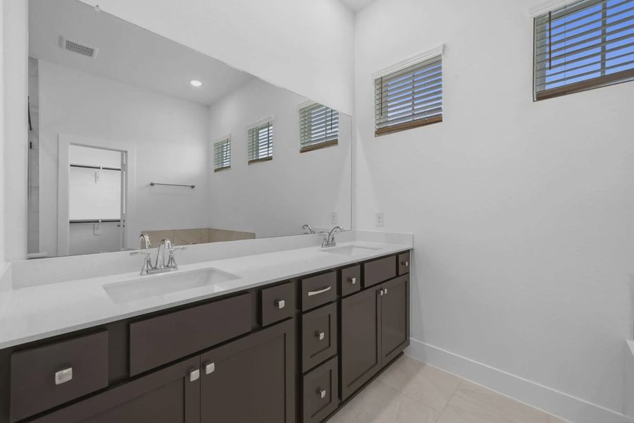 Representative furnished interior of a home built from the Cheverny by Chesmar Homes in Bridgeland Chateau, Cypress (Image 10).