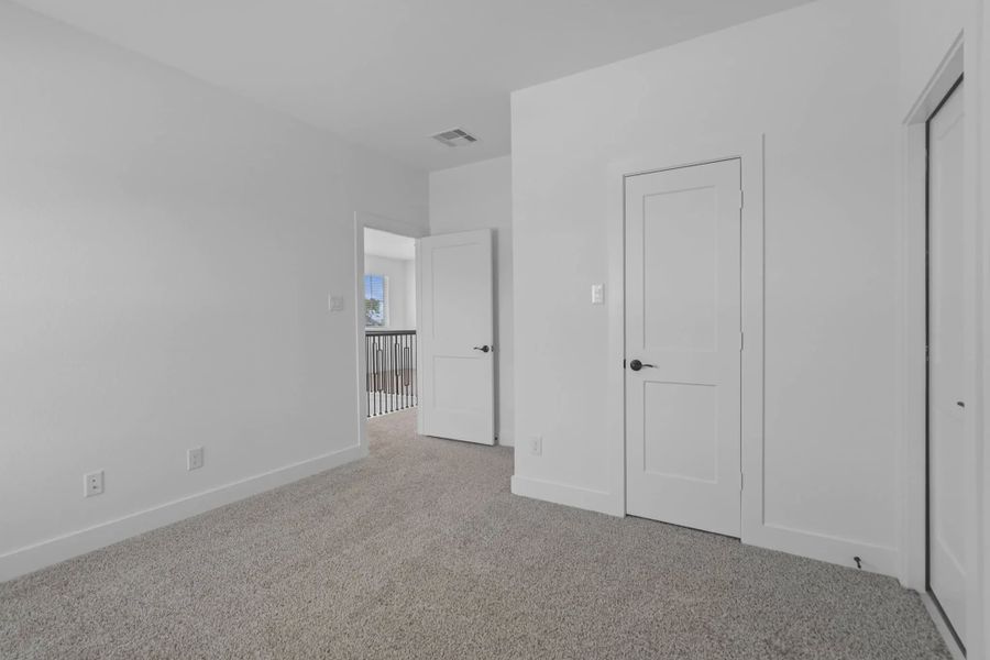 Representative unfurnished interior of a home built from the St Andrews by Chesmar Homes in Riceland Alley Loads, Mont Belvieu (Image 48).