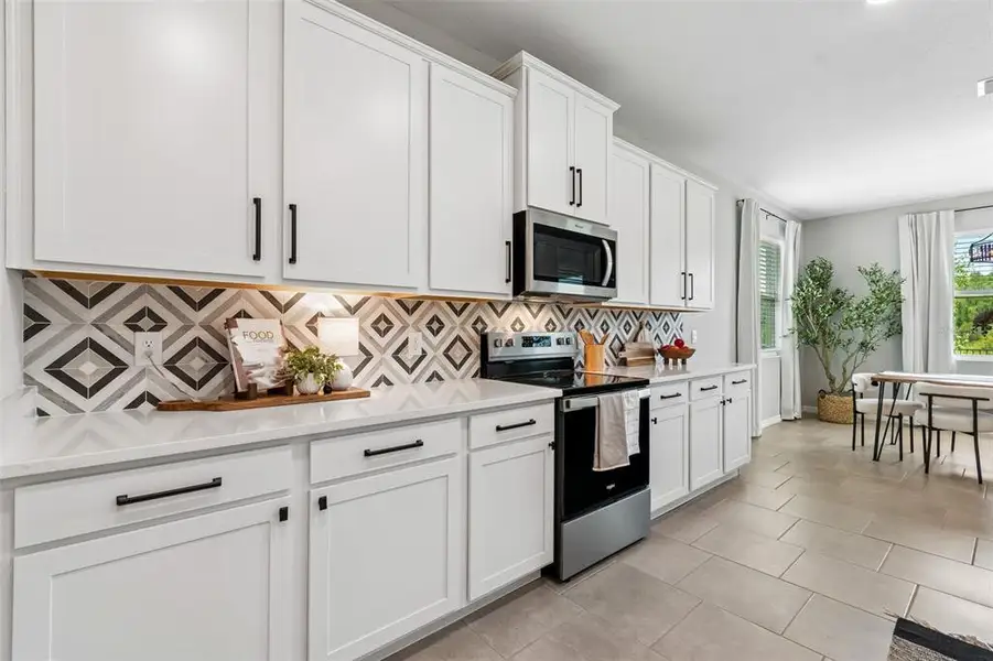 Furnished interior view inside a new home in Deerbrook, Land O' Lakes (Image 5).