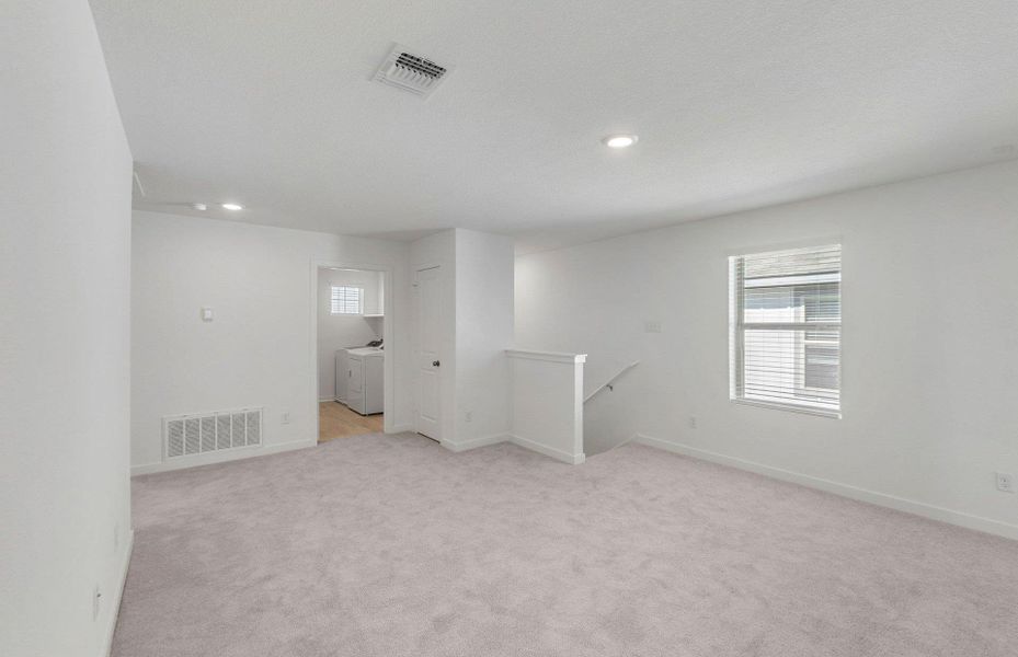 Spacious, unfurnished interior of a new home in Sonterra, Jarrell (Image 17).