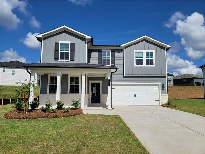 Front exterior of a new home in Reserve at Gum Springs, Jefferson, GA, highlighting curb appeal (Image 22). Front exterior of a new home in Reserve at Gum Springs, Jefferson, GA, highlighting curb appeal (Image 22).