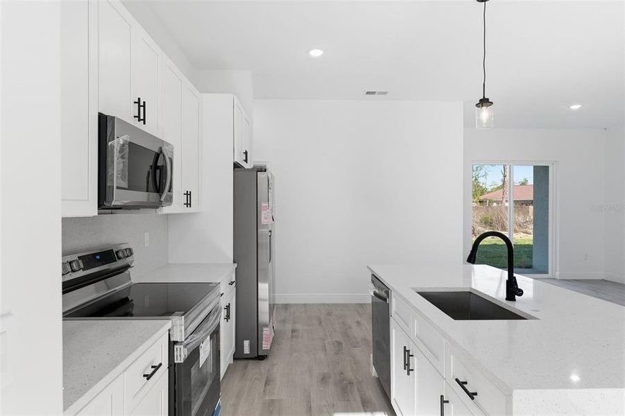 Furnished interior view inside a new home in , Ocala (Image 8).