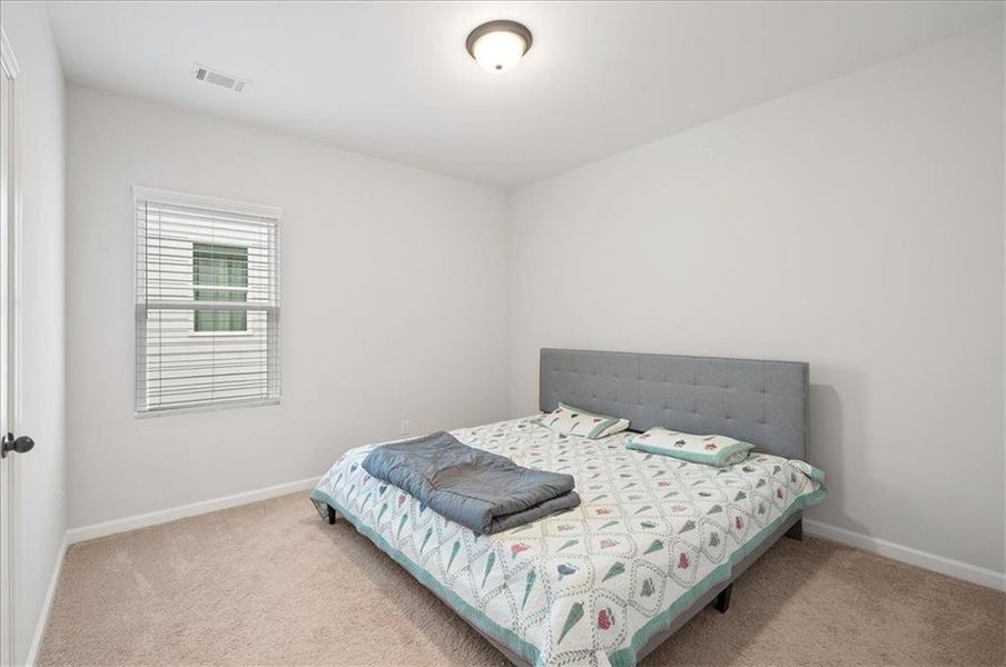Furnished interior view inside a new home in Enclave at Edgewater, Holly Springs (Image 36).