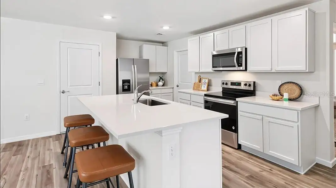 Furnished interior view inside a new home in Twisted Oaks, Wildwood (Image 8).