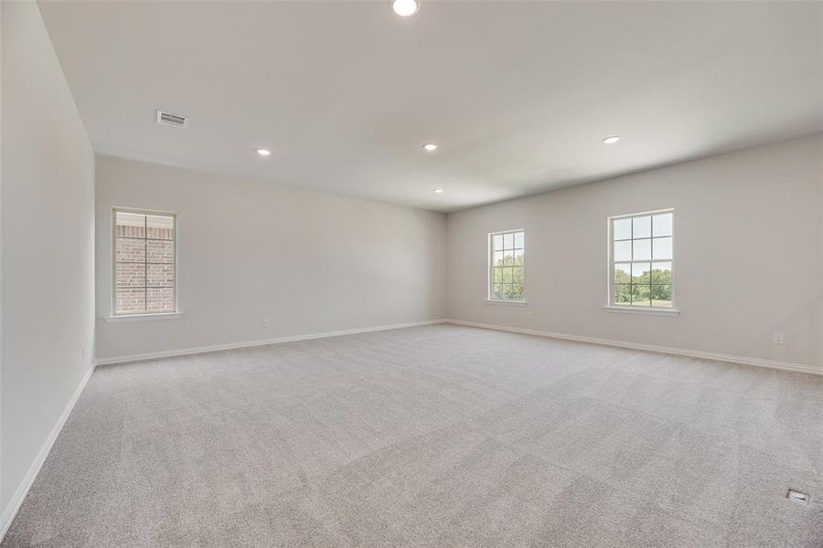 Spacious, unfurnished interior of a new home in Valencia On The Lake, Little Elm (Image 34).