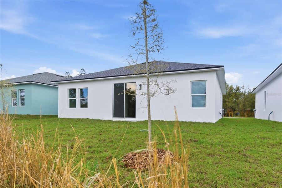 Exterior details and patio area of a home in , Osteen (Image 4).