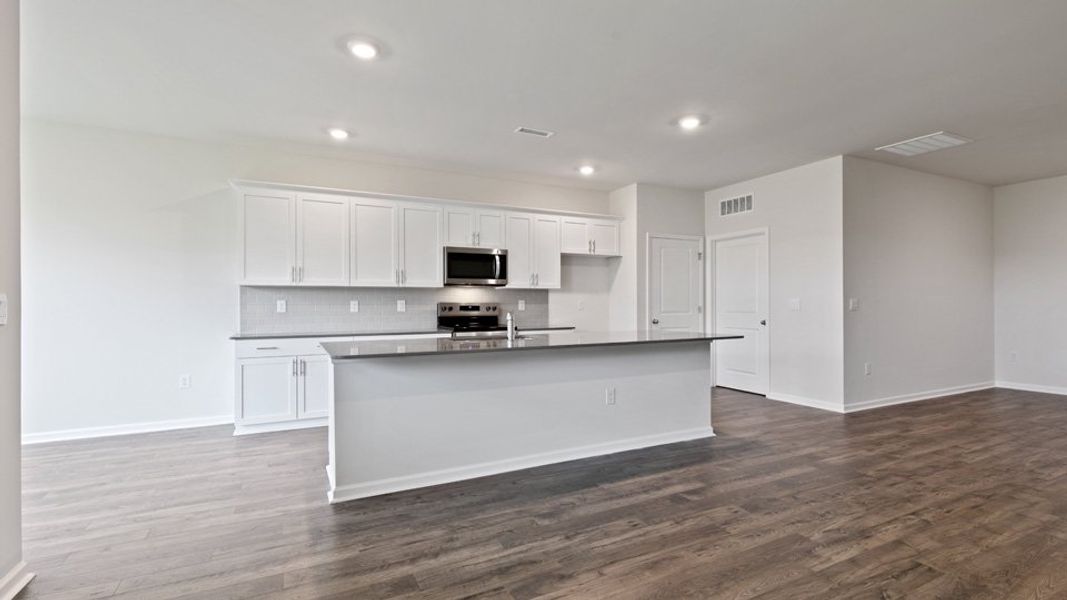 Furnished interior view inside a new home in East Ridge, Ayden (Image 9).
