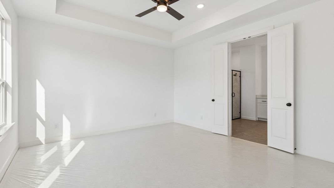 Representative unfurnished interior of a home built from the Chapelle III by Normandy Homes in Rainwater Crossing, Celina (Image 14).