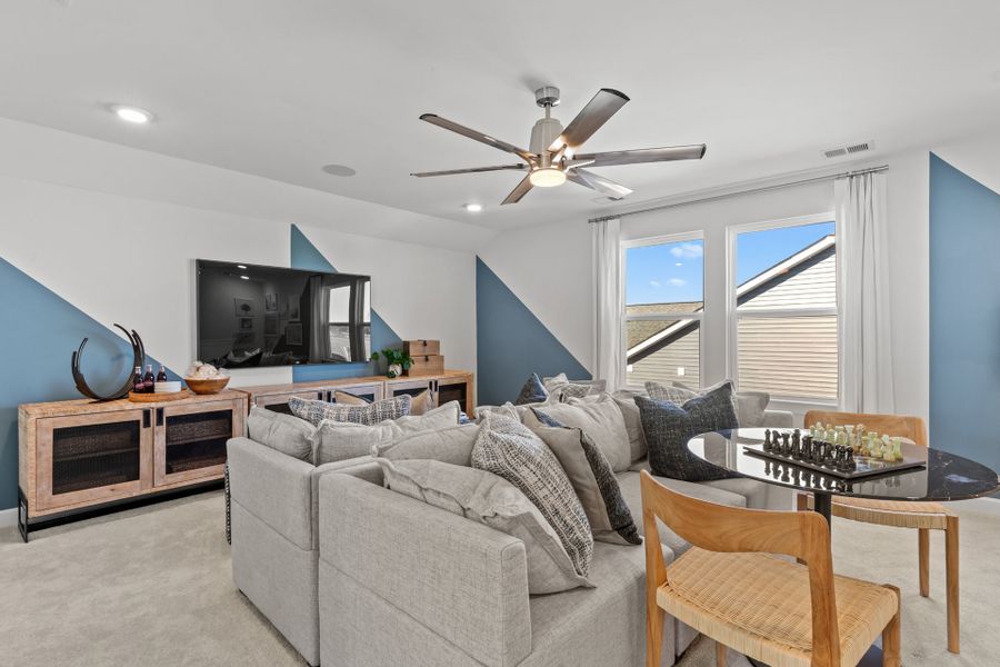 Representative furnished interior of a home built from the The Longboard by Chesapeake Homes in Coastal Club of the Carolinas, Calabash (Image 26).