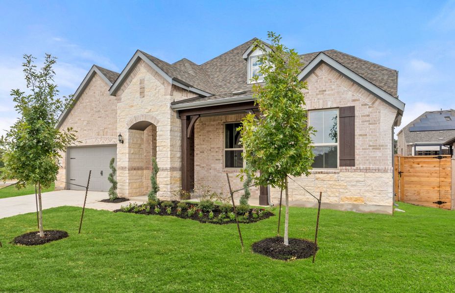 Front exterior of a new home in Bluffview Reserve, Leander, TX, highlighting curb appeal (Image 21).