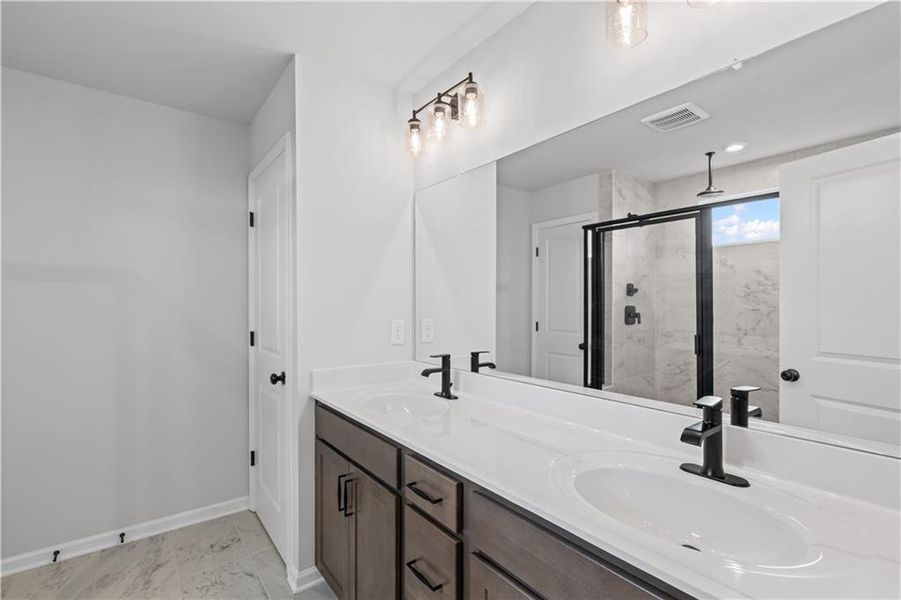 Furnished interior view inside a new home in Reunion, Flowery Branch (Image 10). Furnished interior view inside a new home in Reunion, Flowery Branch (Image 10).