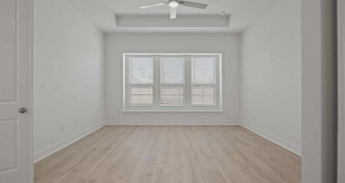 Representative unfurnished interior of a home built from the Samantha by Chesmar Homes in Village at Three Oaks, Seguin (Image 10).