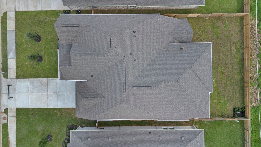 Front exterior of a new home in Coastal Point, League City, TX, highlighting curb appeal (Image 22).