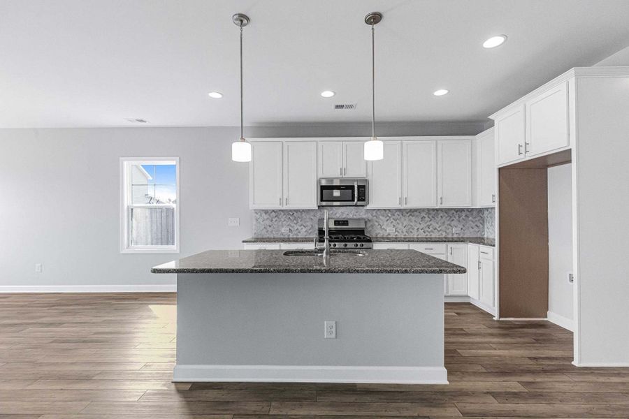 Representative furnished interior of a home built from the Dogwood by Caviness & Cates Communities in Maggie Way, Wendell (Image 117).