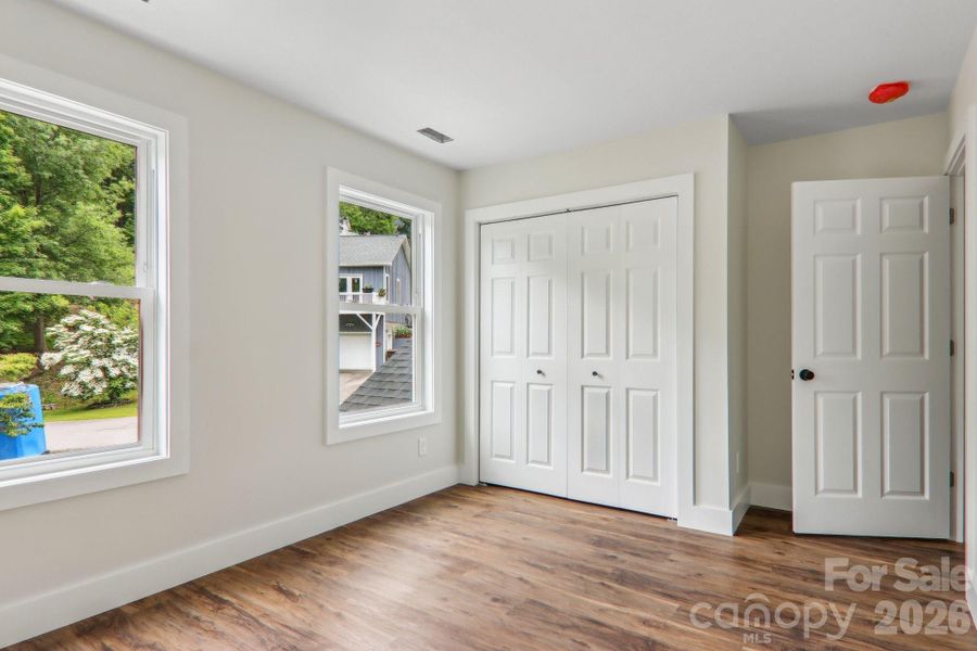 Spacious, unfurnished interior of a new home in , Waynesville (Image 38).