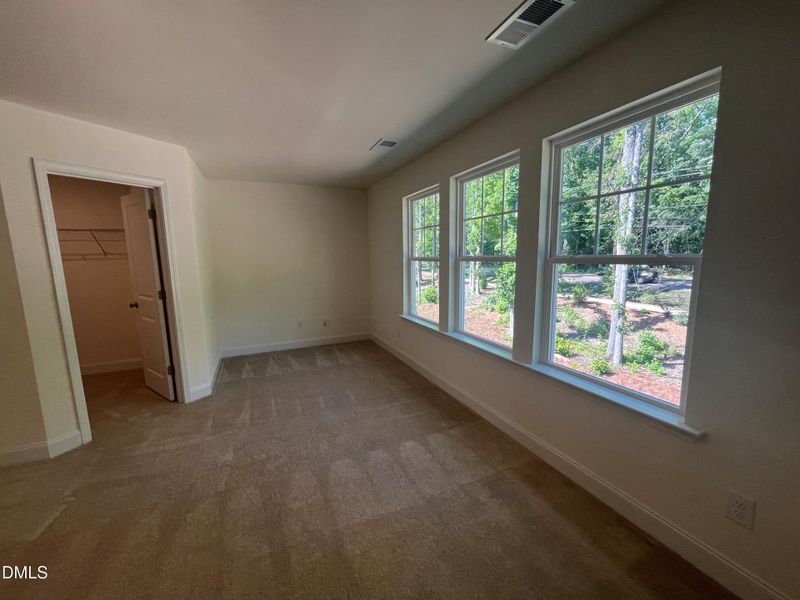 Primary Suite with large windows Primary Suite with large windows