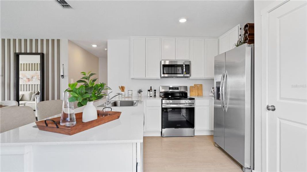 Furnished interior view inside a new home in , Kissimmee (Image 8).