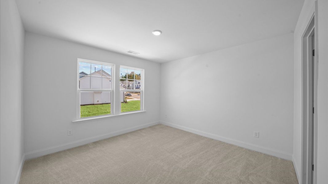 Representative furnished interior of a home built from the Freesia by DRB Homes in Essex Village, Franklinton (Image 37).