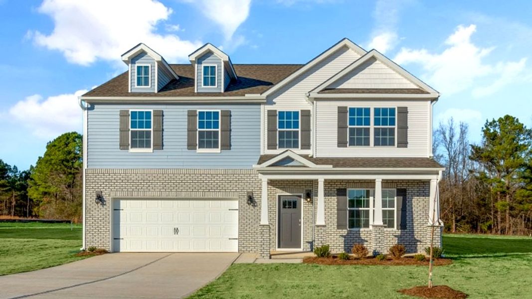 Representative exterior photo of a completed home built from the COLUMBIA by D.R. Horton in Old Fields, Haw River, NC (Image 23).