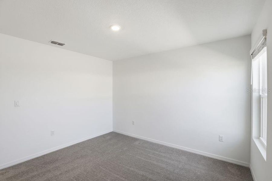 Spacious, unfurnished interior of a new home in Marion Creek, Haines City (Image 22).