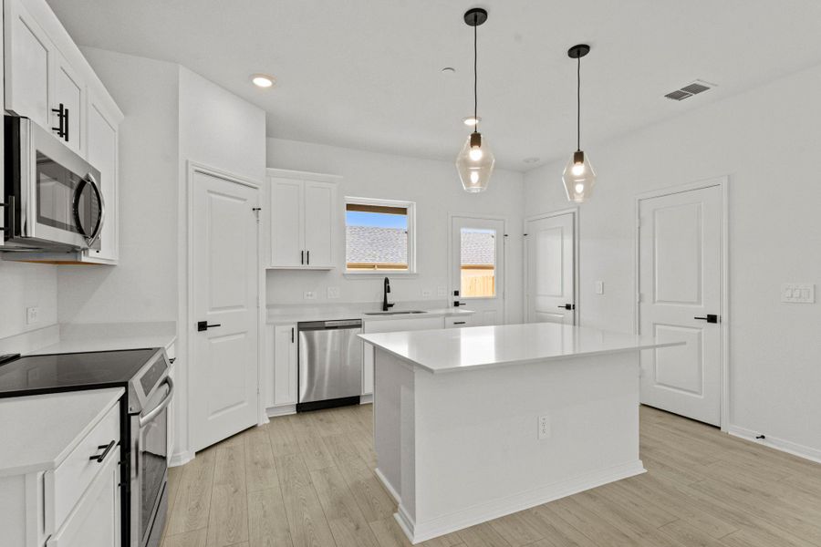 Furnished interior view inside a new home in Avery Centre, Round Rock (Image 11). Furnished interior view inside a new home in Avery Centre, Round Rock (Image 11).