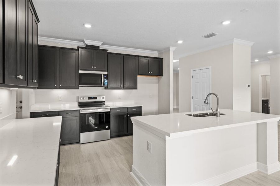 Furnished interior view inside a new home in Windswept Estates, Freeport (Image 7).