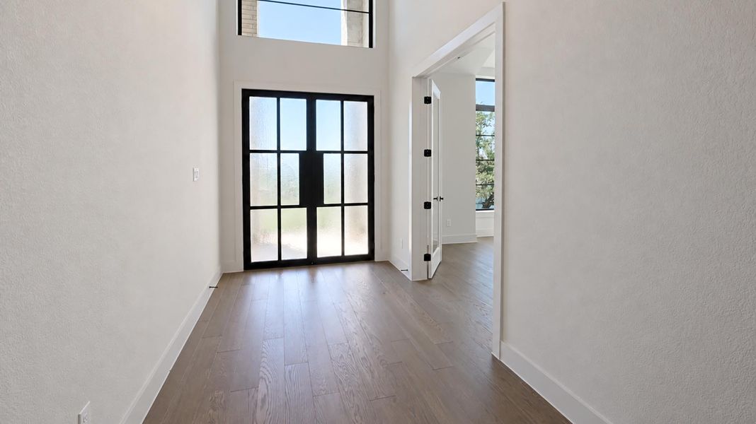 Spacious, unfurnished interior of a new home in Creek of Driftwood, Driftwood (Image 19). Spacious, unfurnished interior of a new home in Creek of Driftwood, Driftwood (Image 19).