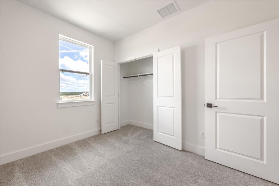 Spacious, unfurnished interior of a new home in Ryegrass Collection – Freedom at Anthem, Kyle (Image 10).