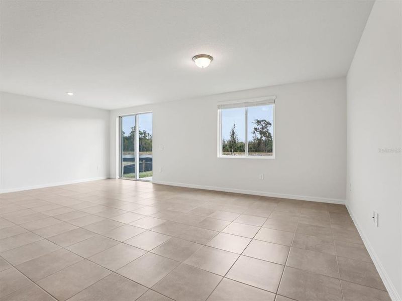 Spacious, unfurnished interior of a new home in The Grove at Stuart Crossing - Classic Series, Bartow (Image 13).