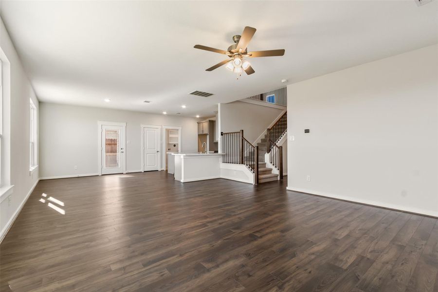 Spacious, unfurnished interior of a new home in Sunterra, Katy (Image 30).