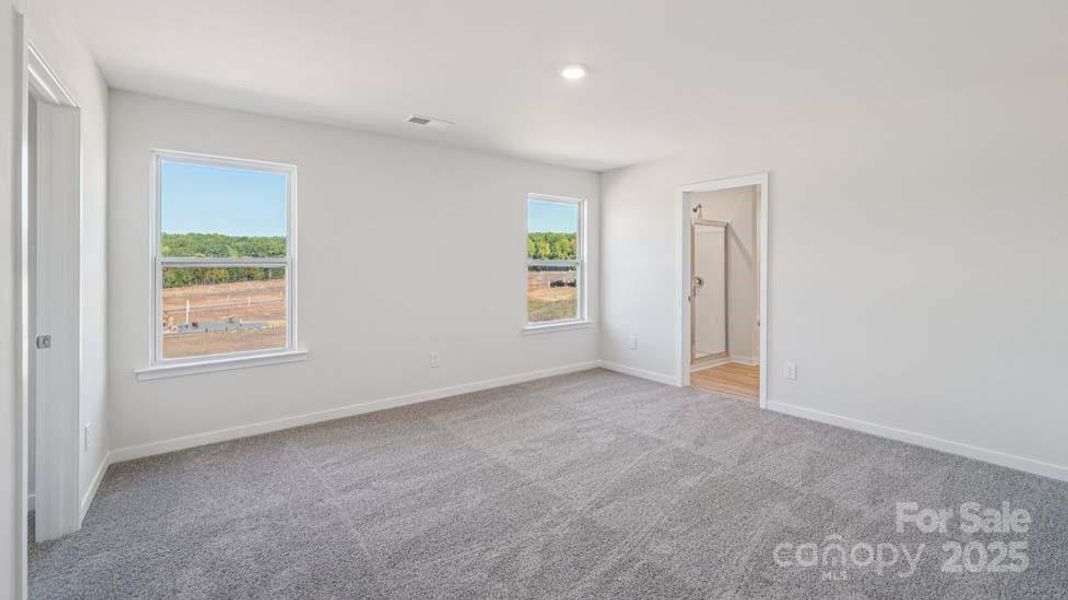 Spacious, unfurnished interior of a new home in Cardinal Creek, Charlotte (Image 11).