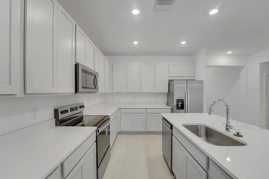 Furnished interior view inside a new home in Cypress Park Estates, Haines City (Image 6).