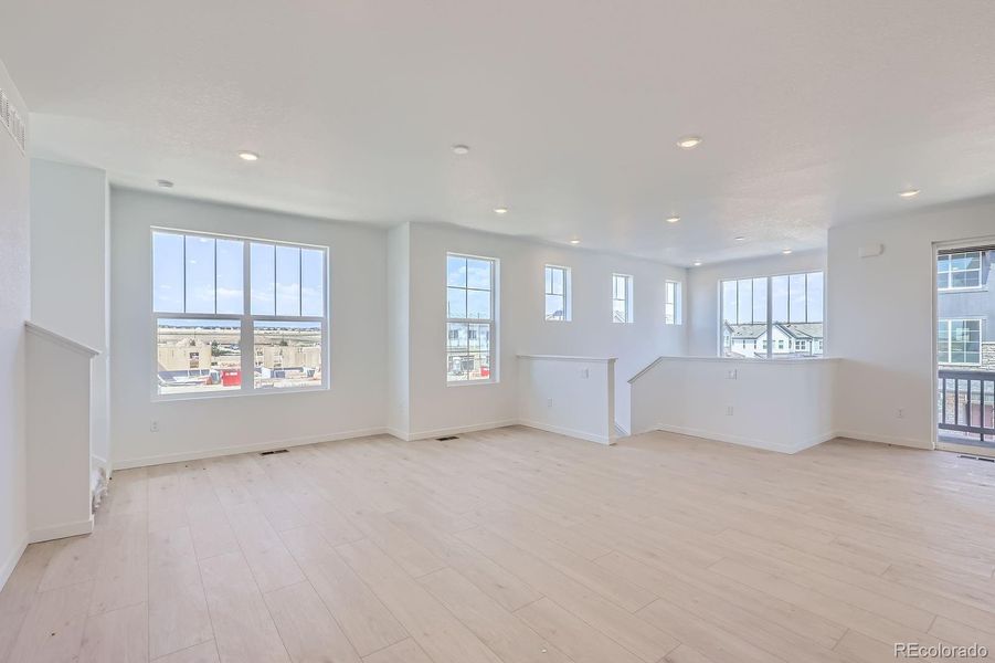 Spacious, unfurnished interior of a new home in Parterre: The Skyline Collection, Thornton (Image 13).