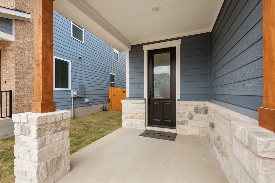 Exterior details and patio area of a home in Lariat, Liberty Hill (Image 3).