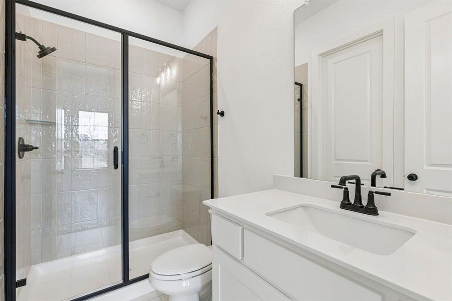 Friends and family will feel right at home in any of the beautifully finished guest baths.