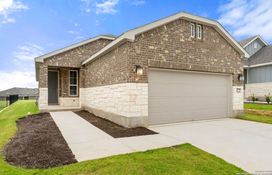Front exterior of a new home in Del Webb New Braunfels at Veramendi, New Braunfels, TX, highlighting curb appeal (Image 18).