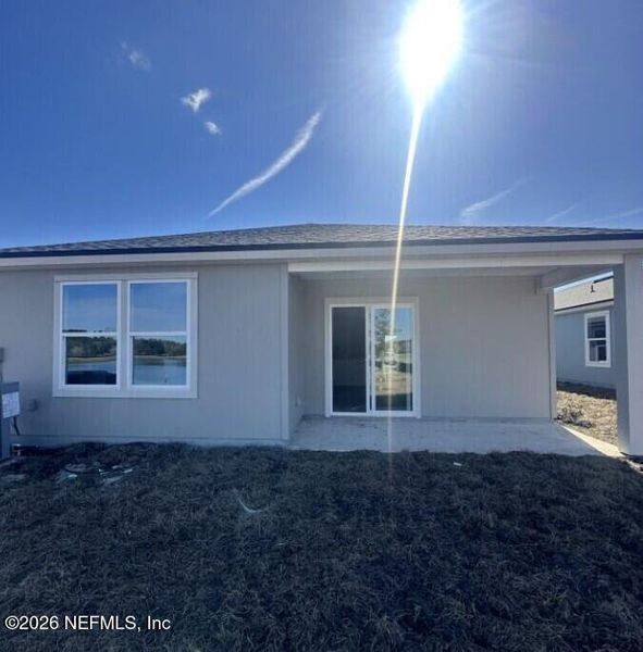 Exterior details and patio area of a home in Rookery, Green Cove Springs (Image 20).