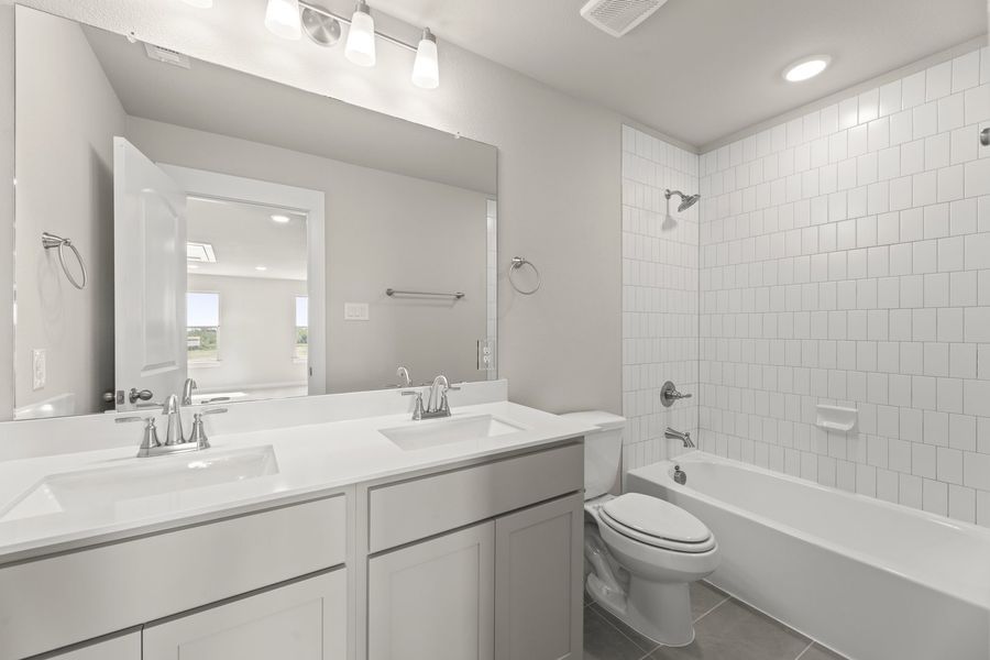 Furnished interior view inside a new home in Hillside Village 40s, Celina (Image 13).