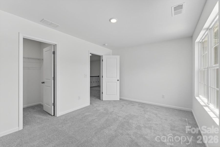 Spacious, unfurnished interior of a new home in Creekside Cottages, Bessemer City (Image 13).