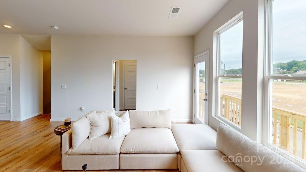 Furnished interior in a model home at Vanguard at Vermillion in Huntersville (Image 6).