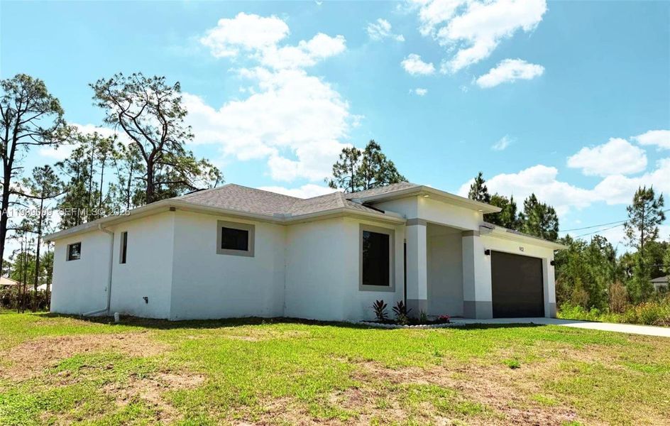 Exterior details and patio area of a home in , Lehigh Acres (Image 3). Exterior details and patio area of a home in , Lehigh Acres (Image 3).