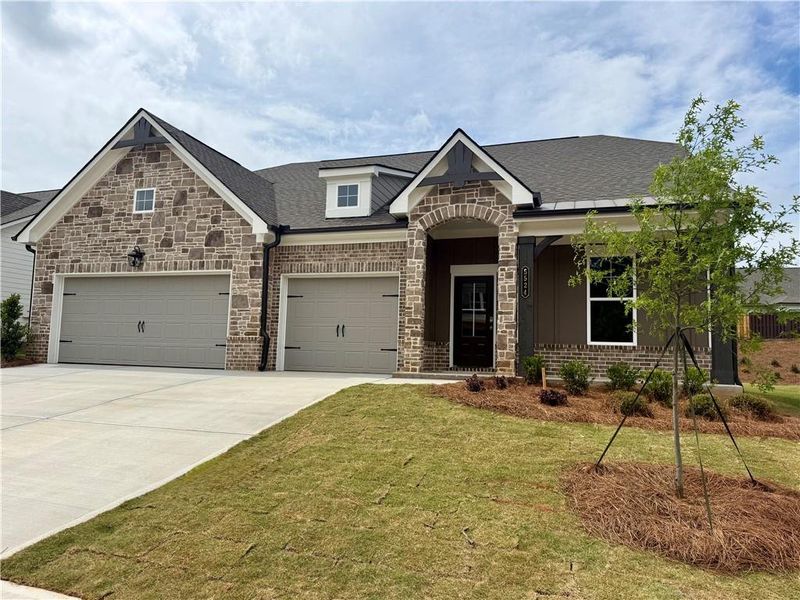 Front exterior of a new home in Ponderosa Farms Reserve, Gainesville, GA, highlighting curb appeal (Image 26).