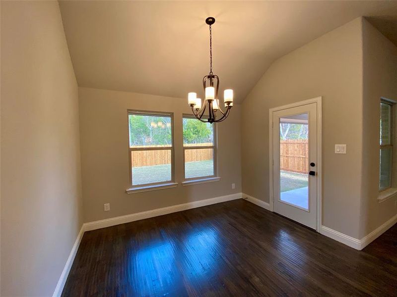Kitchen cafe dining area with ORB chandelier and hardwoods Kitchen cafe dining area with ORB chandelier and hardwoods