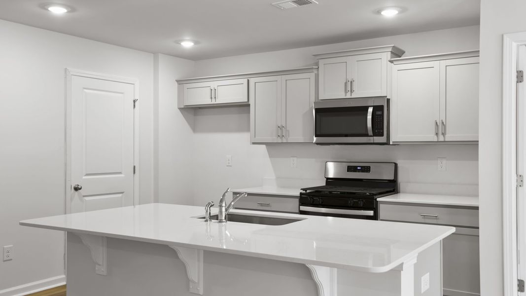 Furnished interior view inside a new home in Bentley Park, Greenwood (Image 6).