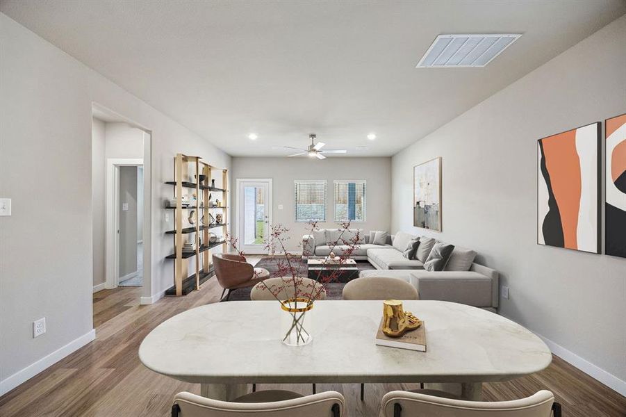 Living and Dining Room in the Willow home plan by Trophy Signature Homes – REPRESENTATIVE PHOTO