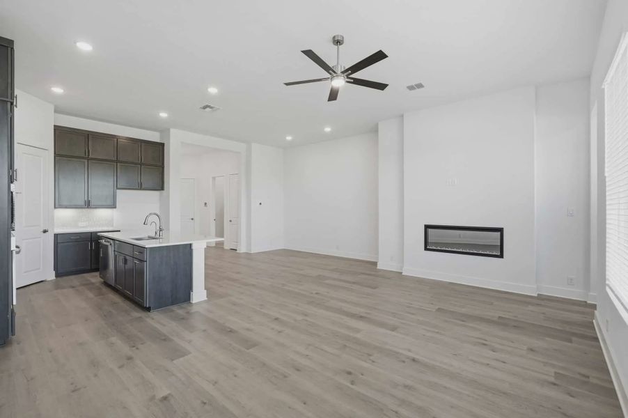 Representative unfurnished interior of a home built from the Delos by Chesmar Homes in Prominence Urban, San Antonio (Image 12).