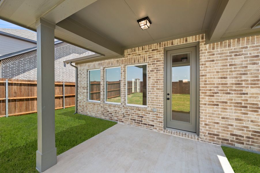 Exterior details and patio area of a home in Wildflower Ranch, Fort Worth (Image 4).