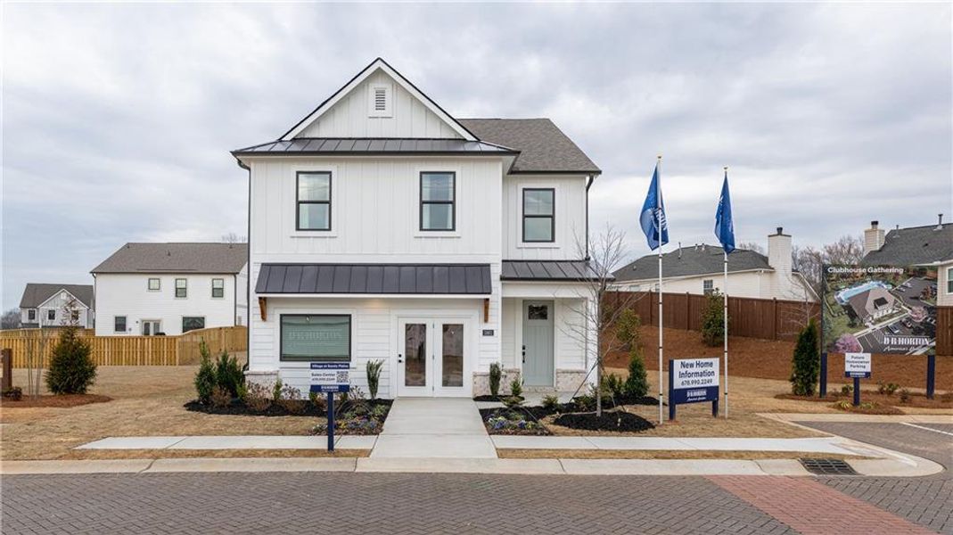 Front exterior of a new home in The Village at Sandy Plains, Marietta, GA, highlighting curb appeal (Image 24).